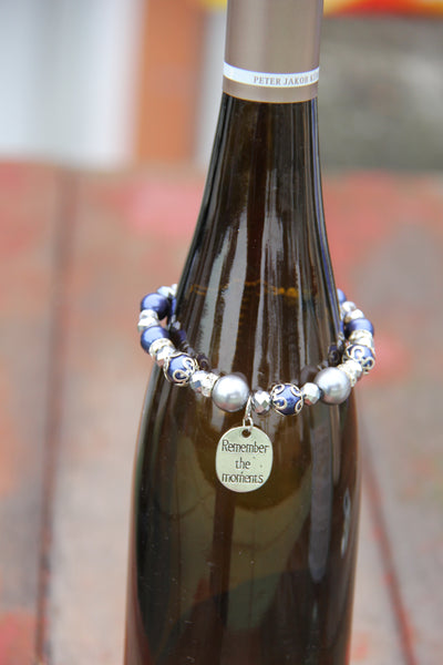 Bottle bracelet made with navy blue and silver beads