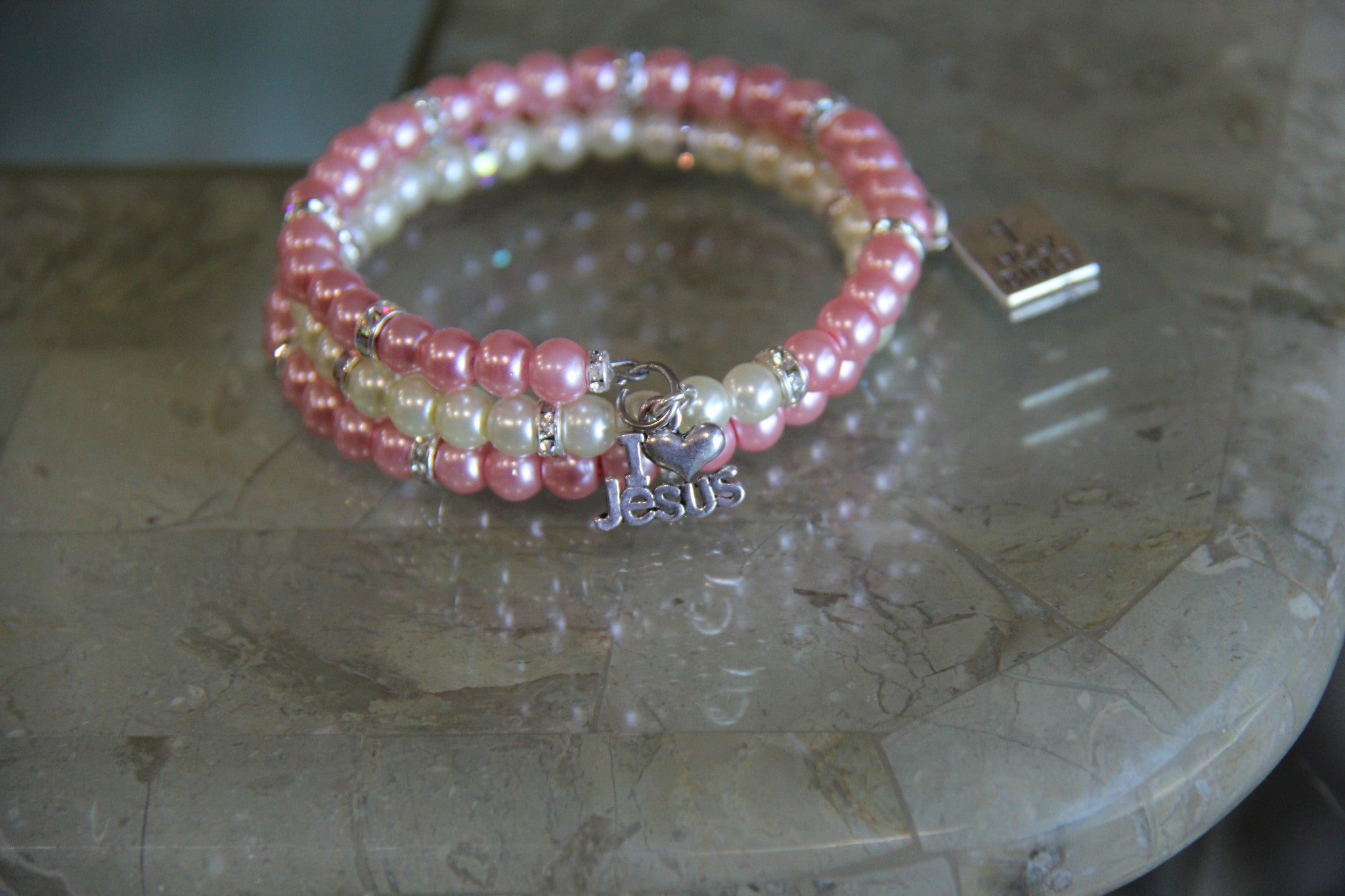 Spring bracelet made with pink and white glass pearl beads
