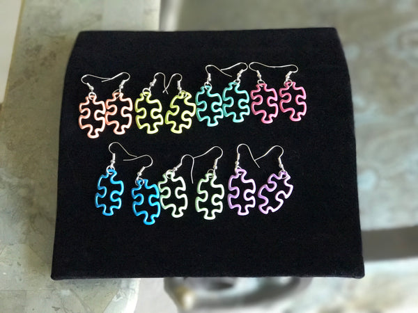 Colored puzzle piece necklace set